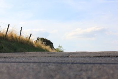 Surface level of road against sky