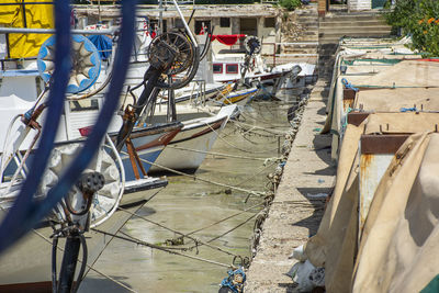 High angle view of fishing boats moored at harbor