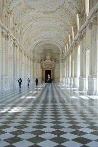 Group of people in corridor of building