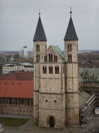 View of old building against sky in city