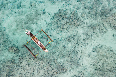 High angle view of cigarette on wall
