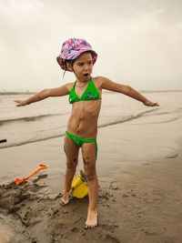 Full length of girl on beach