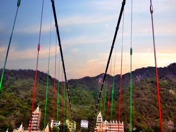 View of swing at sunset