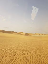 Scenic view of desert against sky