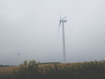 Wind turbines on field