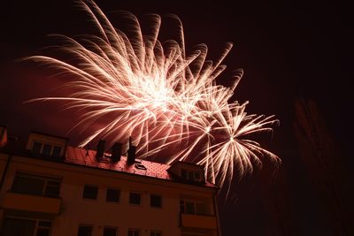 Firework display at night