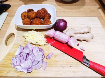 High angle view of chopped vegetables on cutting board