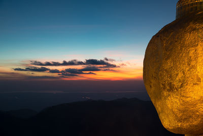 Scenic view of mountain against sky during sunset