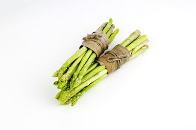 Close-up of asparagus against white background