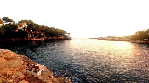 Scenic view of calm sea against clear sky