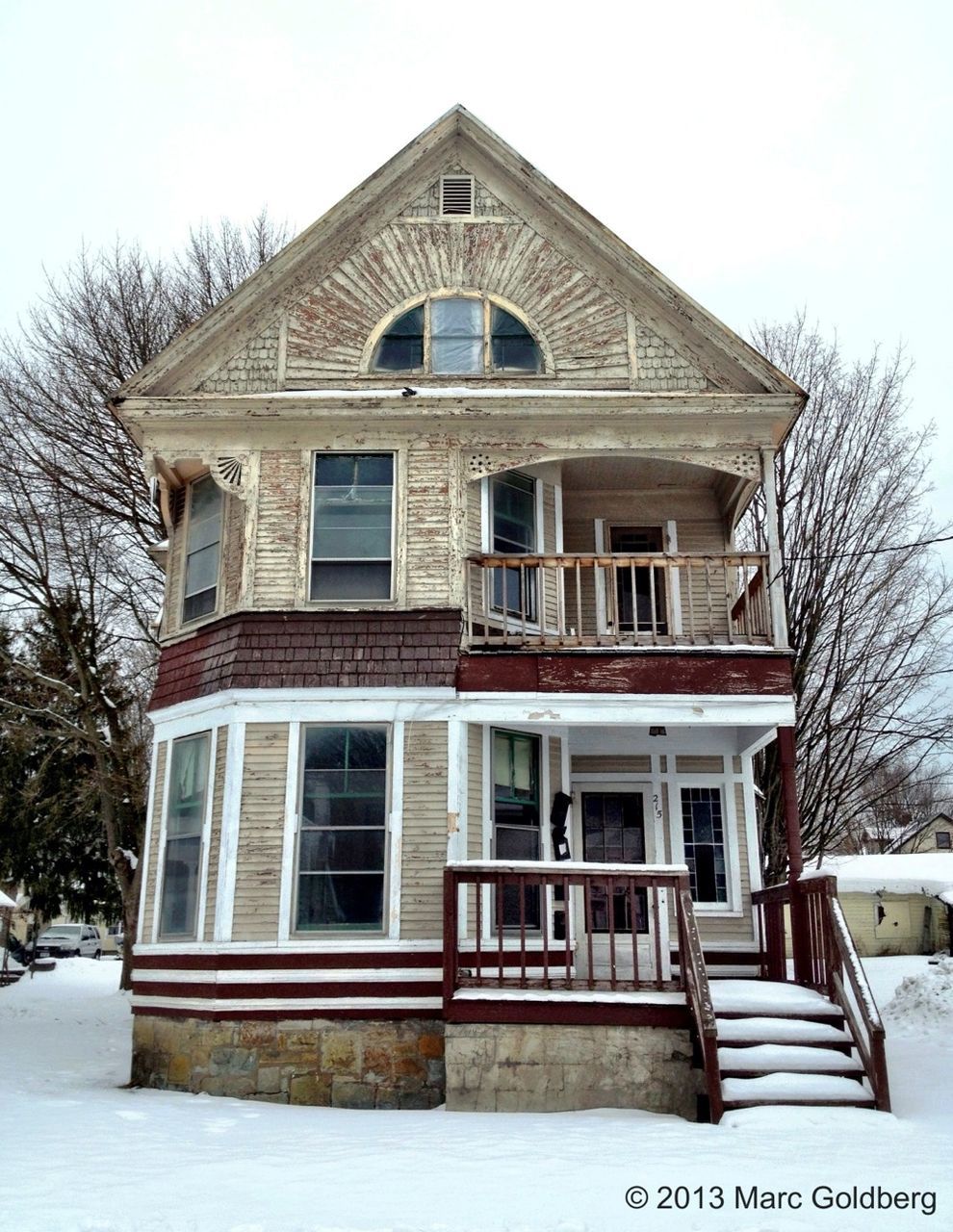 building exterior, architecture, built structure, window, house, residential structure, residential building, winter, snow, tree, clear sky, sky, cold temperature, low angle view, facade, day, exterior, outdoors, building, no people