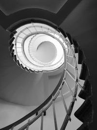 Low angle view of spiral staircase in building