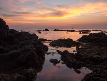 Scenic view of sea against sky during sunset