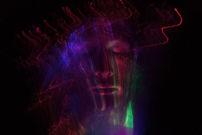 Light painting against black background