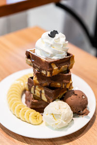 Ice cream in plate on table