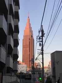 View of skyscrapers in city against sky