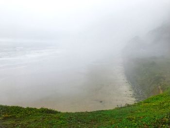 Scenic view of land against sky