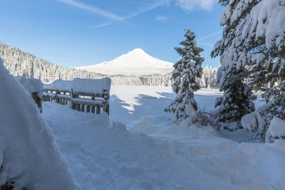 Scenic view of frozen lake against sky