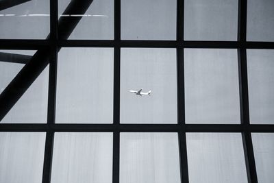 Low angle view of airplane window