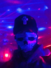 Portrait of person in illuminated nightclub