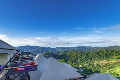 Scenic view of landscape against blue sky