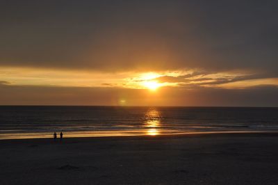 Scenic view of beach during sunset