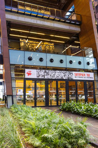 Illuminated text on building at night