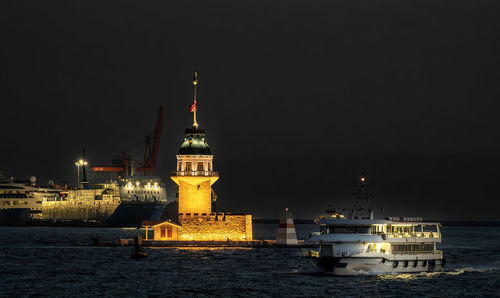 Illuminated buildings in city at night