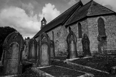 Low angle view of cemetery against sky