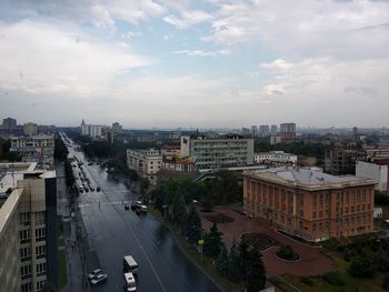 High angle view of road amidst buildings in city