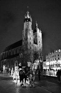 People in city at night