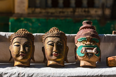 Close-up of statue against temple