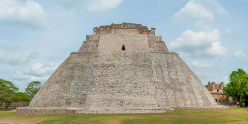 Castle against cloudy sky