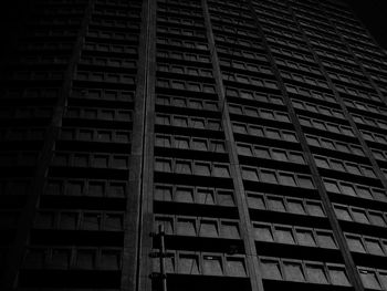 Low angle view of apartment building at night