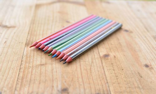 High angle view of colored pencils on table