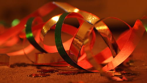 Close-up of streamers on table