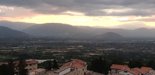 High angle view of townscape against sky during sunset