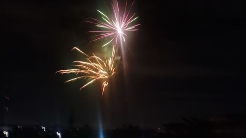 Firework display at night