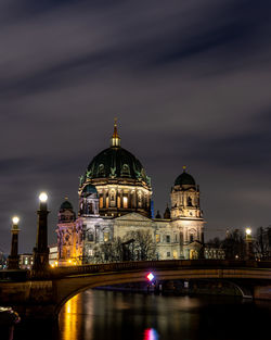 View of illuminated building against sky at night