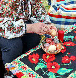 Midsection of woman holding food