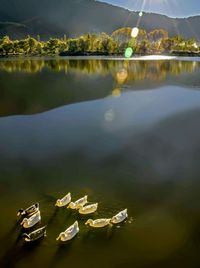 High angle view of boats moored in lake