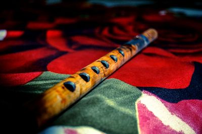 Close-up of flute on fabric