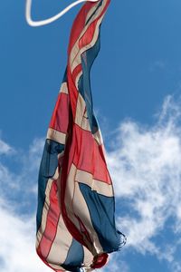 Low angle view of british flag against sky