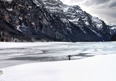 Scenic view of snow covered mountain against sky