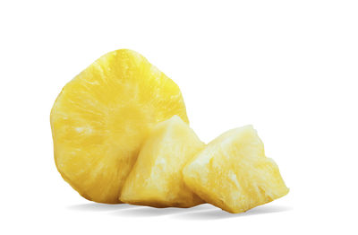 Close-up of lemon against white background