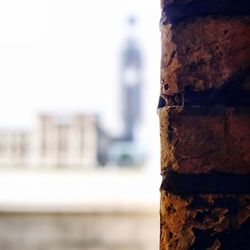 Close-up of rusty metal against wall