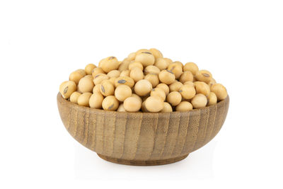 High angle view of eggs in container against white background