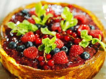 High angle view of strawberries in bowl on table