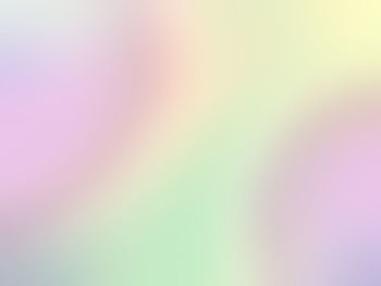 Defocused image of pink bright sun