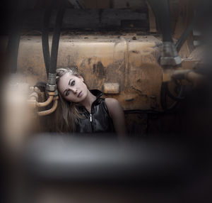 Portrait of young woman looking down